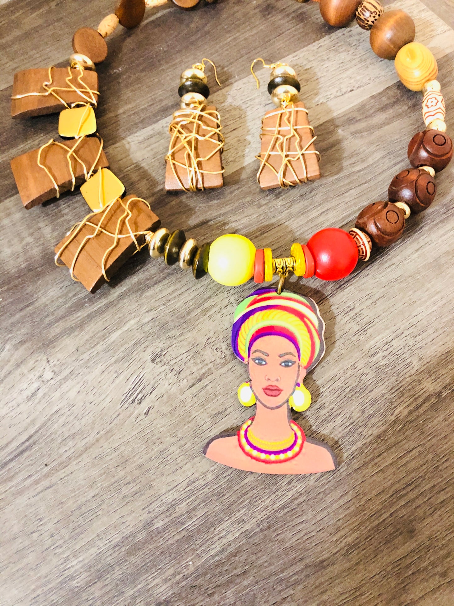 DTBD Brown, Red, Yellow Beaded with Gold Wire Unique Black Lady Charm Necklace & Earrings Set