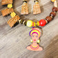 DTBD Brown, Red, Yellow Beaded with Gold Wire Unique Black Lady Charm Necklace  & Earrings Set